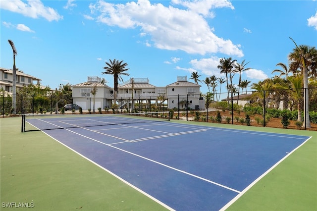 view of sport court featuring basketball hoop