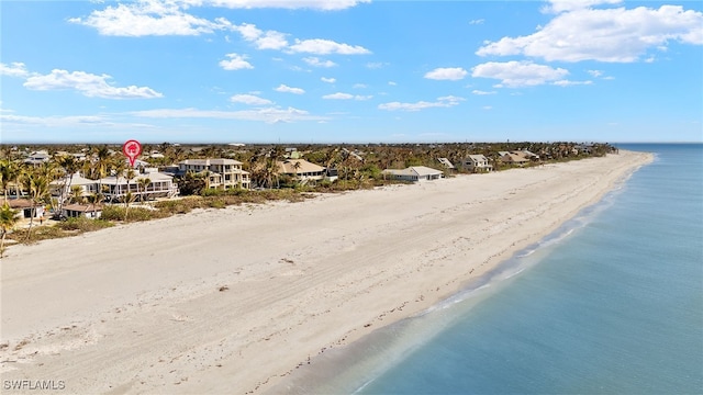 bird's eye view featuring a beach view and a water view