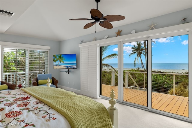 carpeted bedroom featuring access to exterior, ceiling fan, and lofted ceiling