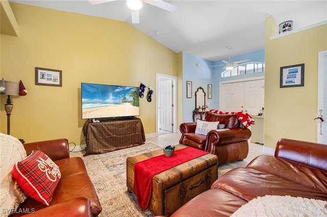 living room featuring high vaulted ceiling and ceiling fan