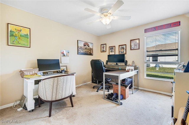 office area with light carpet and ceiling fan