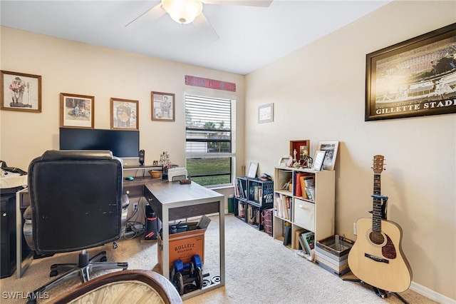 home office featuring ceiling fan and carpet flooring