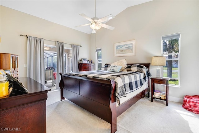 bedroom featuring lofted ceiling, access to outside, light colored carpet, and ceiling fan