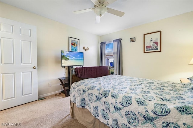 bedroom with ceiling fan and light colored carpet