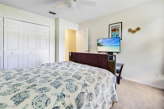 bedroom featuring a closet, ceiling fan, and carpet