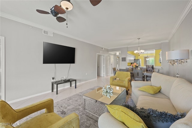 living room with light tile patterned flooring, crown molding, and an inviting chandelier