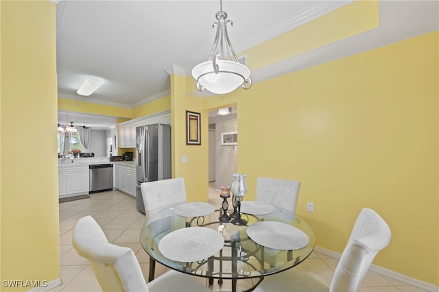 tiled dining area featuring ornamental molding