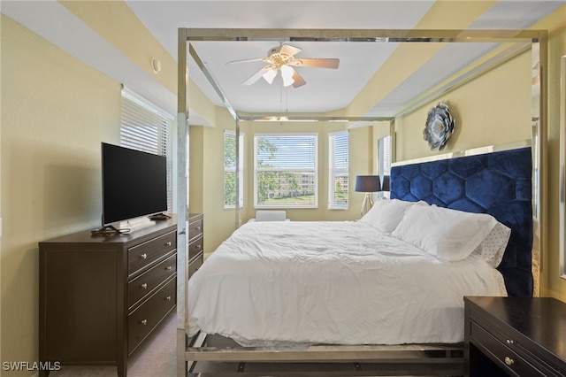 bedroom featuring ceiling fan and carpet floors