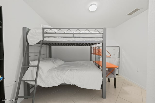 bedroom with tile patterned flooring