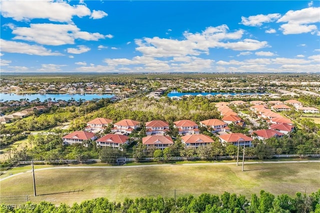 drone / aerial view with a water view