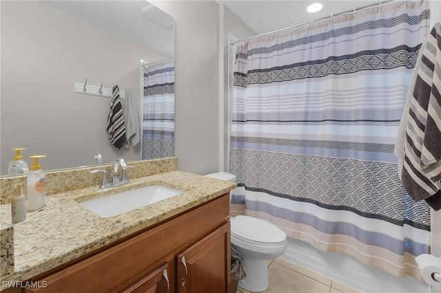 full bathroom with tile patterned flooring, vanity, toilet, and shower / tub combo with curtain