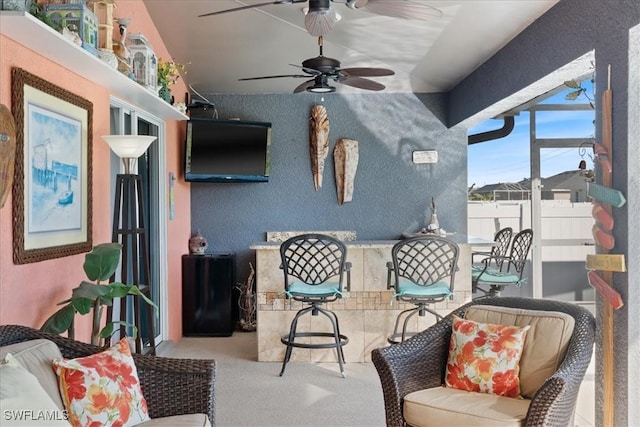 view of patio with ceiling fan