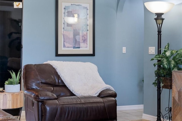 sitting room featuring light tile patterned floors