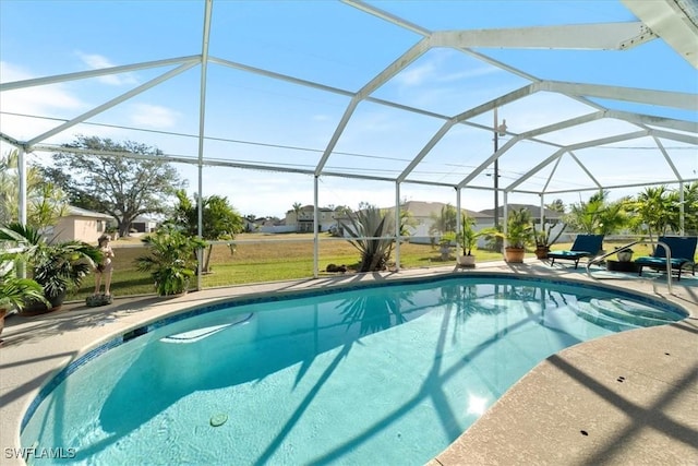 view of pool featuring a lanai and a patio