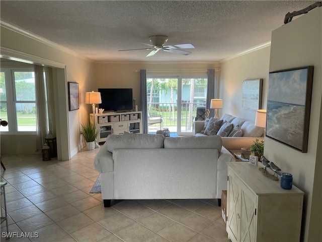 634 12th Ave S Unit 634, Naples, FL 34102 - living area with ornamental molding, a ceiling fan, light tile patterned flooring, and a textured ceiling