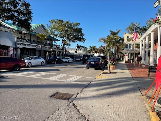 634 12th Ave S Unit 634, Naples, FL 34102 - view of asphalt street with sidewalks, curbs, and street lights