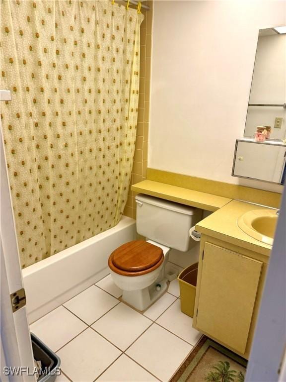 full bathroom featuring tile patterned flooring, vanity, shower / bath combination with curtain, and toilet