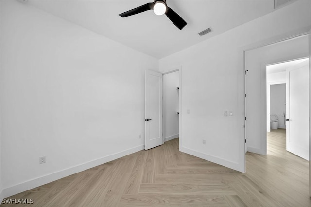 unfurnished bedroom featuring ceiling fan