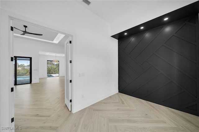 hallway with light parquet flooring