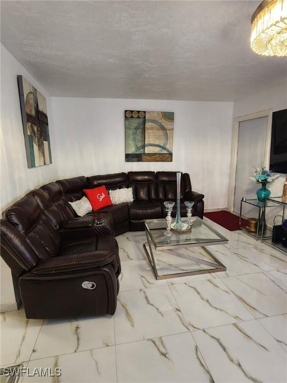 living room with a textured ceiling