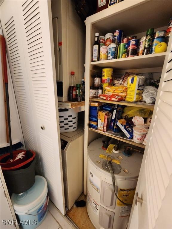 pantry featuring electric water heater