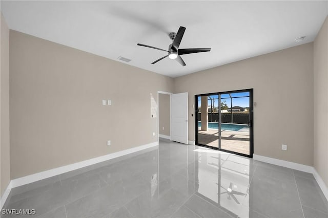 empty room featuring ceiling fan