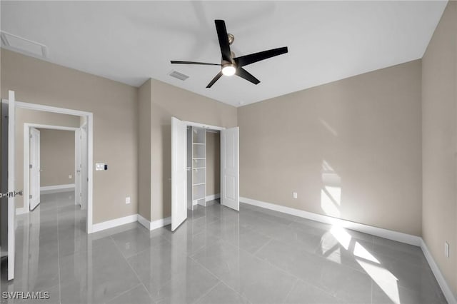 spare room with ceiling fan