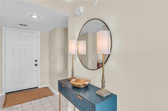 view of tiled foyer entrance