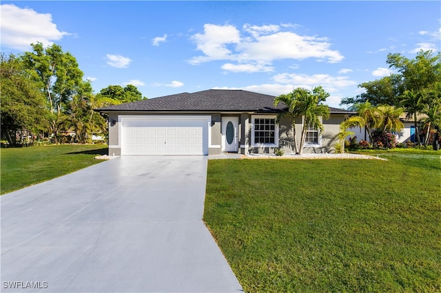 ranch-style house featuring a garage and a front yard