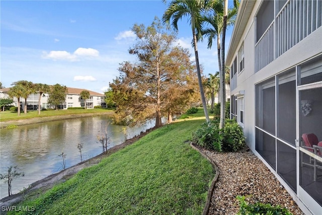 view of yard featuring a water view