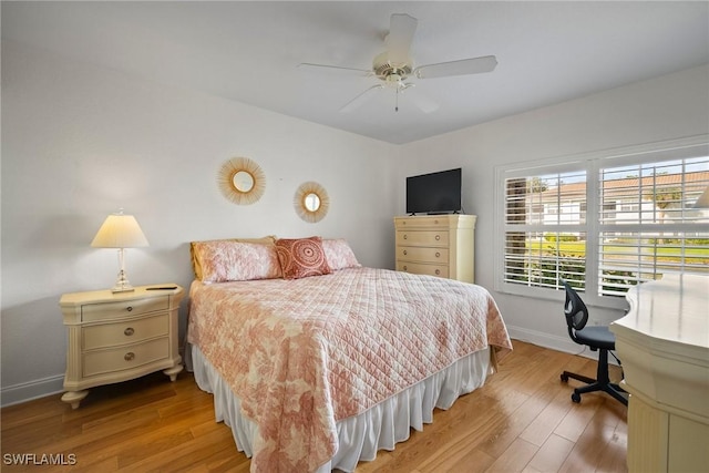 bedroom featuring wood-type flooring and ceiling fan