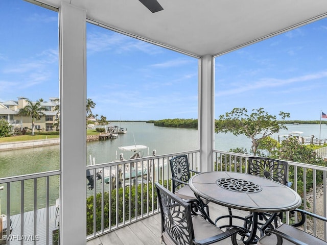 balcony featuring a water view