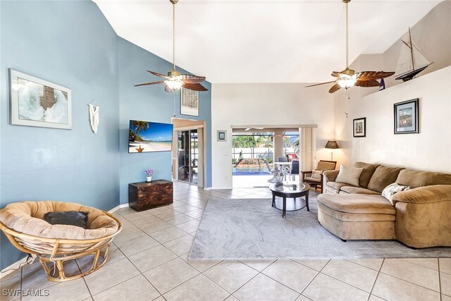 tiled living room featuring a towering ceiling