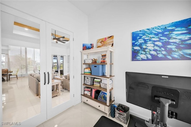 interior space with ceiling fan and french doors