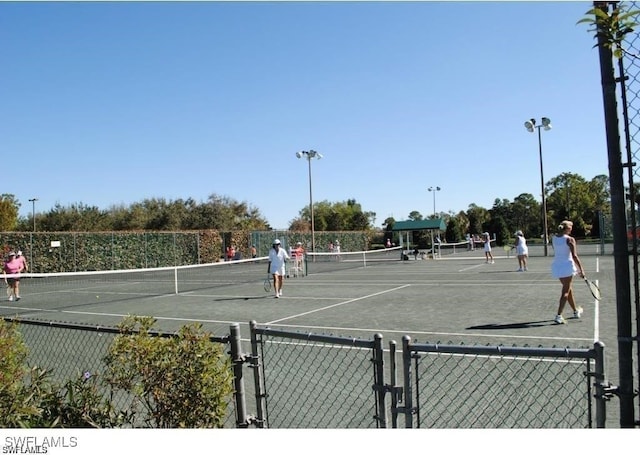 1051 Eastham Way Unit B-204, Naples, FL 34104 - view of tennis court