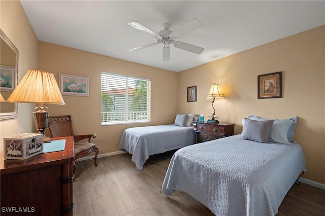 1051 Eastham Way Unit B-204, Naples, FL 34104 - bedroom with wood finished floors, baseboards, and a ceiling fan