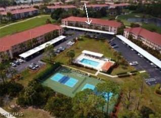 1051 Eastham Way Unit B-204, Naples, FL 34104 - bird's eye view of a pool