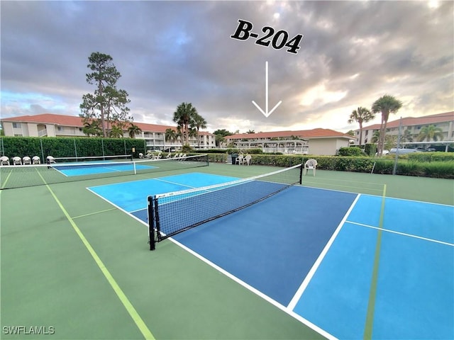 1051 Eastham Way Unit B-204, Naples, FL 34104 - view of tennis court