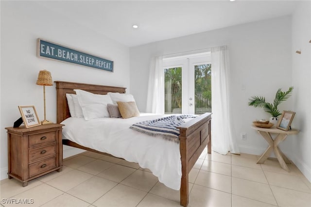 bedroom with light tile patterned floors, access to outside, and french doors