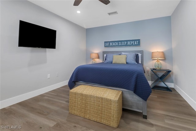 bedroom featuring hardwood / wood-style flooring and ceiling fan