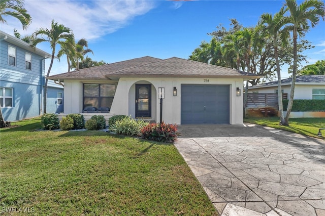 ranch-style house with a front lawn and a garage