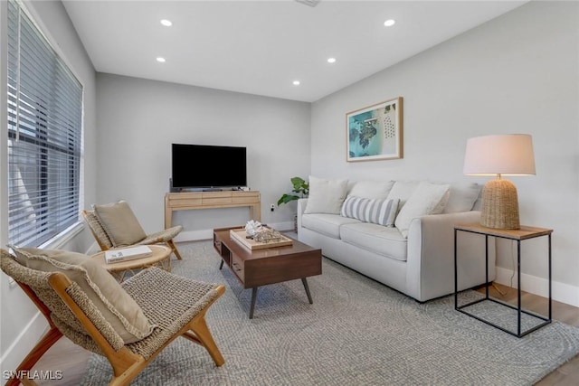 living room with light hardwood / wood-style floors