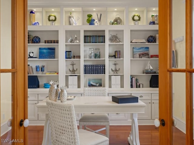 office area with wood-type flooring