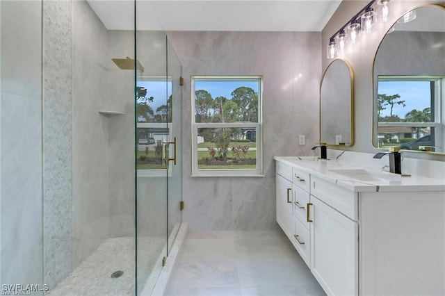 bathroom with vanity and walk in shower