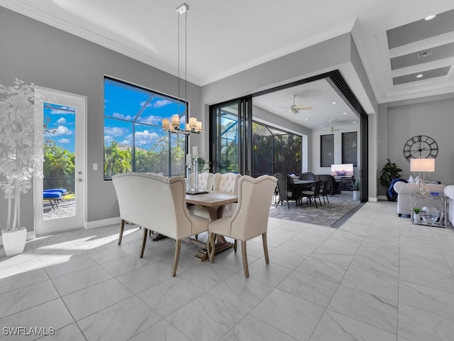 dining area with ceiling fan with notable chandelier and ornamental molding