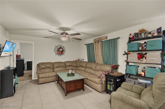 tiled living room featuring ceiling fan