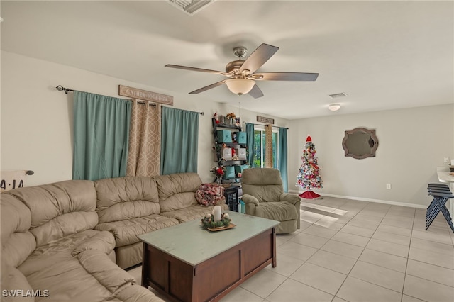 living room with light tile patterned floors and ceiling fan