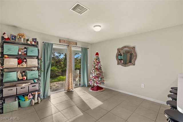 interior space with tile patterned floors