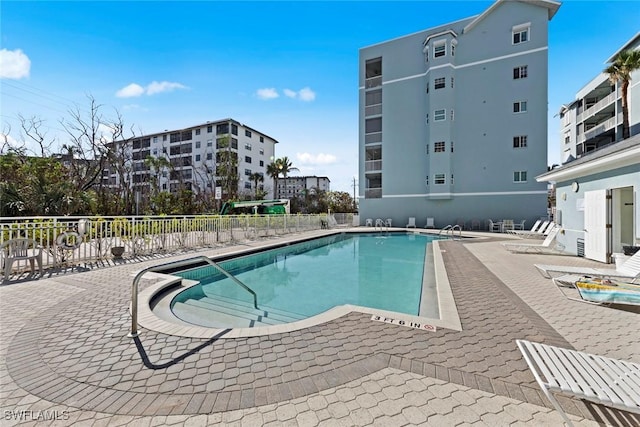 view of pool featuring a patio