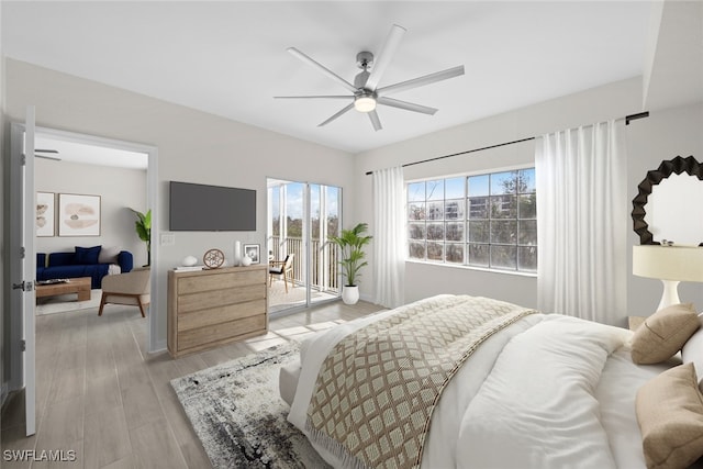 bedroom with access to outside, ceiling fan, and light hardwood / wood-style flooring